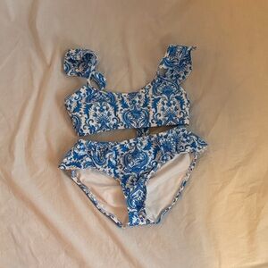 Gb girls blue and white swimsuit.